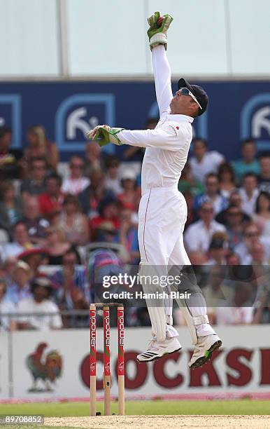 Matthew Prior of England jumps high to collect a return throw during day two of the npower 4th Ashes Test Match between England and Australia at...