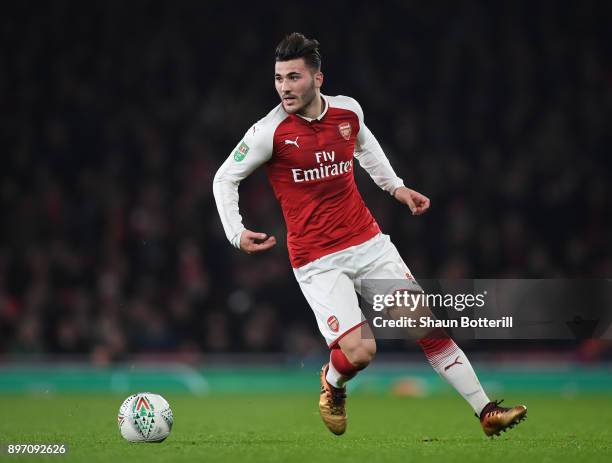 Sead Kolasinac of Arsenal runs with the ball during the Carabao Cup quarter final match between Arsenal and West Ham Unitedat Emirates Stadium on...