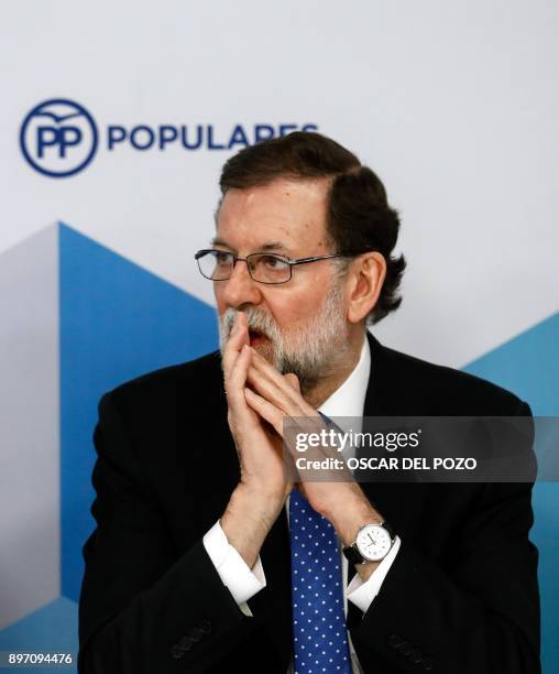 Spanish Prime Minister Mariano Rajoy attends a Popular Party meeting of the national executive committee held one day after the Catalan regional...