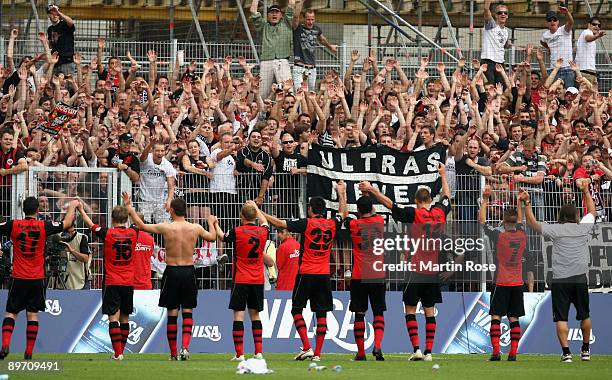 The team of Frankfurt celebrate with the fans after the Bundesliga match between Werder Bremen and Eintracht Frankfurt at the Weser stadium on August...