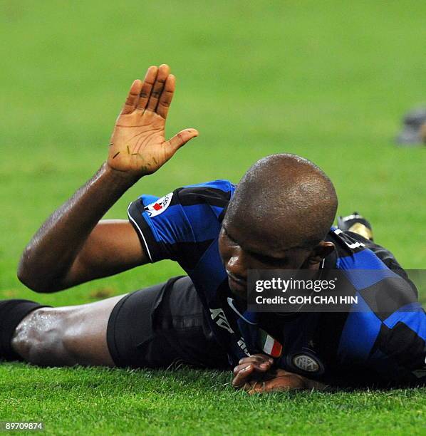 Inter Milan's Samuel Eto'o Fils reacts after missing a shot at goal during the Italian Super Cup match against Lazio at the National Stadium, also...
