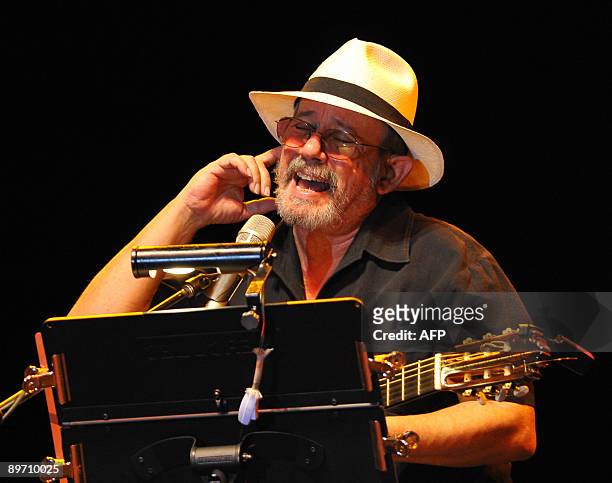 Cuban singer Silvio Rodriguez performs during a presentation on August 7, 2009 in Guayaquil, Ecuador. Rodriguez visits the country invited by...