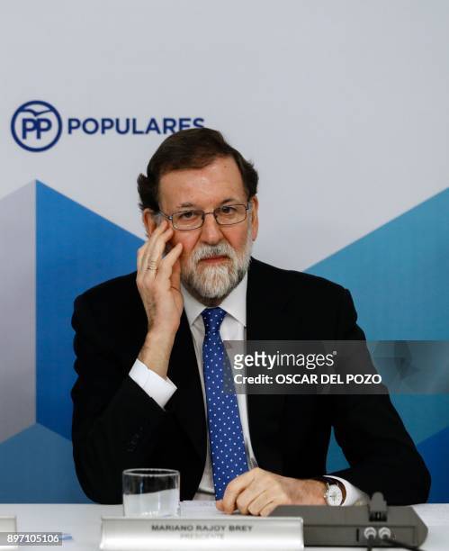 Spanish Prime Minister Mariano Rajoy attends a Popular Party meeting of the national executive committee held one day after the Catalan regional...