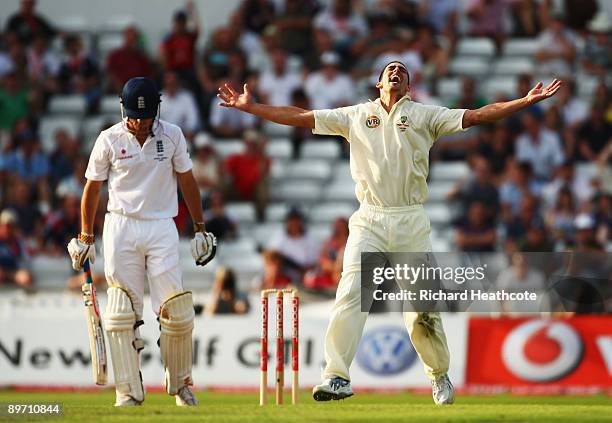 Mitchell Johnson of Australia celebrates the wicket of Alastair Cook of England during day two of the npower 4th Ashes Test Match between England and...