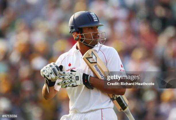 Ravi Bopara of England walks back after being dismissed by Ben Hilfenhaus of Australia during day two of the npower 4th Ashes Test Match between...