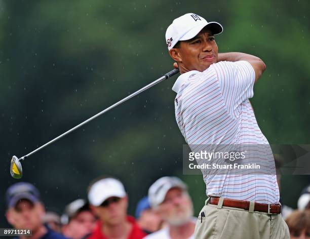 Tiger Woods of USA plays his tee shot on the third hole during the third round of the World Golf Championship Bridgestone Invitational on August 8,...