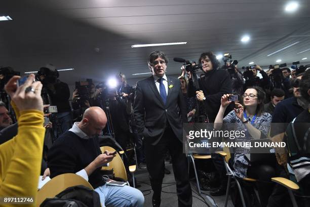Axed Catalan president Carles Puigdemont arrives for a press conference on December 22, 2017 in Brussels, a day after the Catalonia's regional...