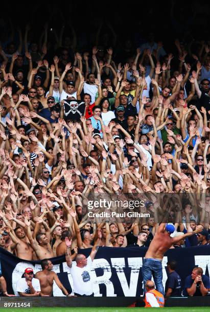 Napoli fans sing and chant during the Bobby Moore Cup between West Ham United and Napoli at Upton Park on August 8, 2009 in London, England.