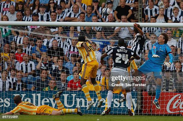 West Brom defender Jonas Olsson scores a list minute goal which is dissalowed during the Coca Cola Championship game between West Bromwich Albion and...
