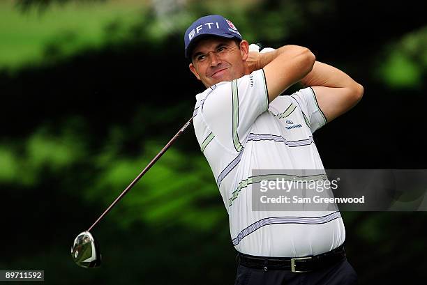 Padraig Harrington of Ireland plays a shot on the 2nd hole during the third round of the WGC-Bridgestone Invitational on the South Course at...
