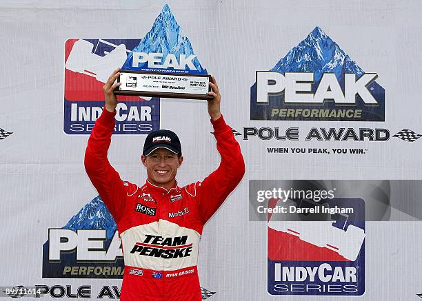 Ryan Briscoe driver of the Team Penske Dallara Honda celebrates pole position for the IRL IndyCar Series The Honda Indy 200 on August 8, 2009 at the...