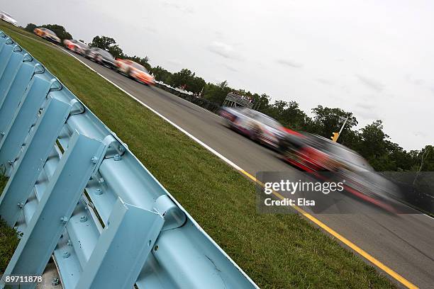 Cars race during the NASCAR Nationwide Series Zippo 200 at Watkins Glen International on August 8, 2009 in Watkins Glen, New York.