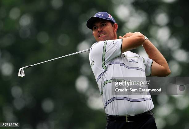 Padraig Harrington of Ireland plays a shot on the 15th hole during the third round of the WGC-Bridgestone Invitational on the South Course at...