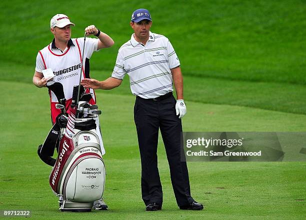 Padraig Harrington of Ireland plays a shot on the 1st hole during the third round of the WGC-Bridgestone Invitational on the South Course at...