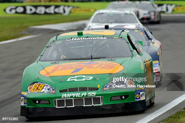 Morgan Shepherd, driver of the Lagina Plumbing/Eldora Speedway Chevrolet, leads a group of car during the NASCAR Nationwide Series Zippo 200 at...