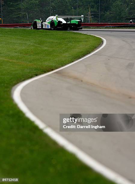 Chris Dyson drives the LMP2 Dyson Racing Lola B09 Mazda during the American Le Mans Series Acura Sports Car Challenge on August 8, 2009 at the...