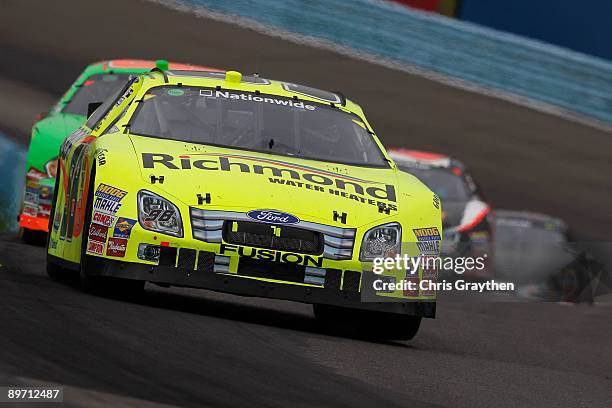 Paul Menard, driver of the Richmond/Menards Ford, leads a pack of cars during the NASCAR Nationwide Series Zippo 200 at Watkins Glen International on...