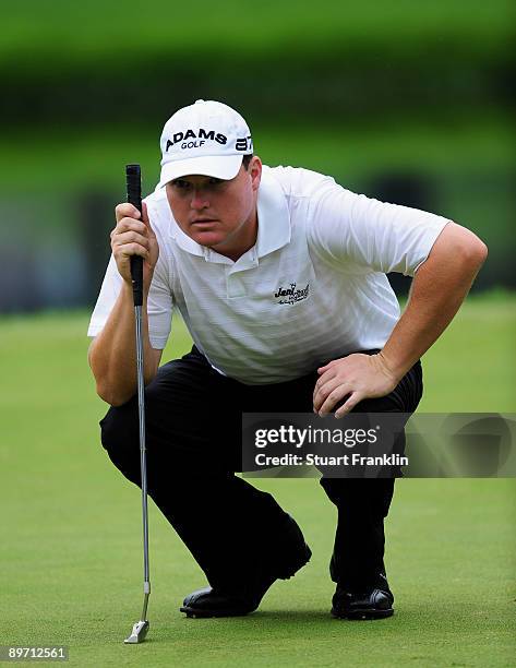 Chad Campbell of USA lines up his putt on the 16th hole during the third round of the World Golf Championship Bridgestone Invitational on August 8,...