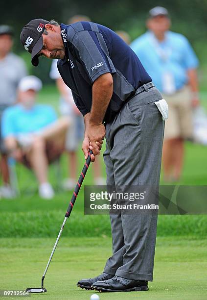 Angel Cabrera of Argentina plutting on the 11th hole during the third round of the World Golf Championship Bridgestone Invitational on August 8, 2009...