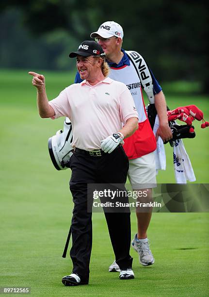 Miguel Angel Jimenez of Spain looks happy during the third round of the World Golf Championship Bridgestone Invitational on August 8, 2009 at...