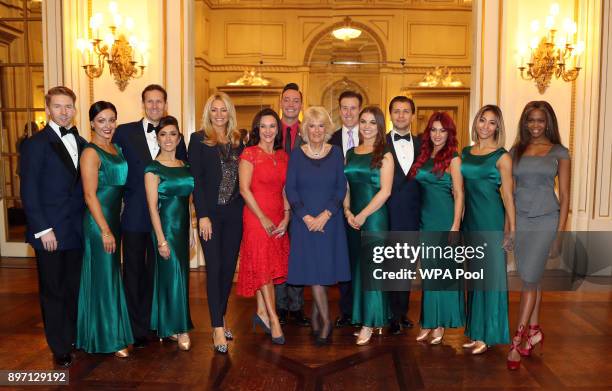 Camilla, Duchess of Cornwall , President of the National Osteoporosis Society, poses with "Strictly Come Dancing" professional dancers Neil Jones,...