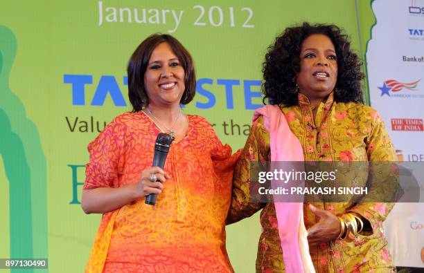 Television talk show host Oprah Winfrey poses with Indian Journalist Barkha Dutt during the DSC Jaipur Literature Festival in Jaipur on January 22,...