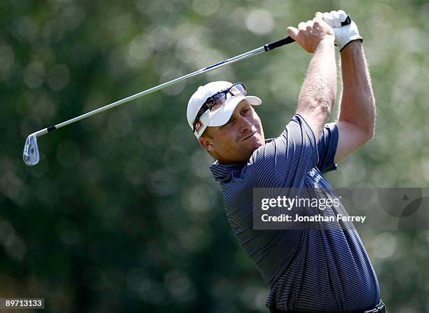 John Rollins tees off on the 5th hole during the third round of the Legends Reno-Tahoe Open on August 8, 2009 at Montreux Golf and Country Club in...