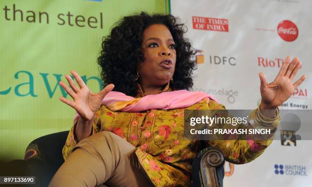 Television talk show host Oprah Winfrey gestures while in conversation with Indian Journalist Barkha Dutt during the DSC Jaipur Literature Festival...