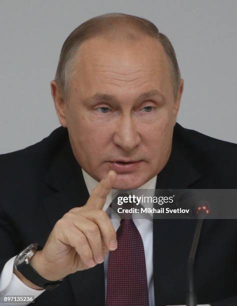 Russian President Vladimir Putin attends a meeting with officers at the Annual Board of Defence Ministrty at the Strategic Missile Troops Academy on...