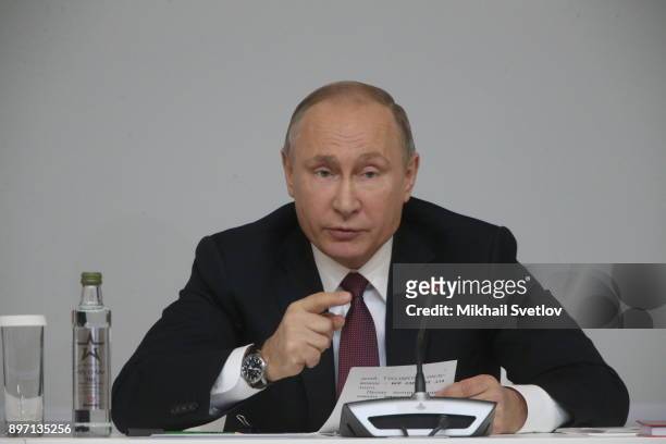 Russian President Vladimir Putin attends a meeting with officers at the Annual Board of Defence Ministrty at the Strategic Missile Troops Academy on...