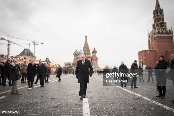 British Foreign Secretary Boris Johnson in front of St Basil's Cathedral during a visit to Red Square on December 22, 2017 in Moscow, Russia. Boris...