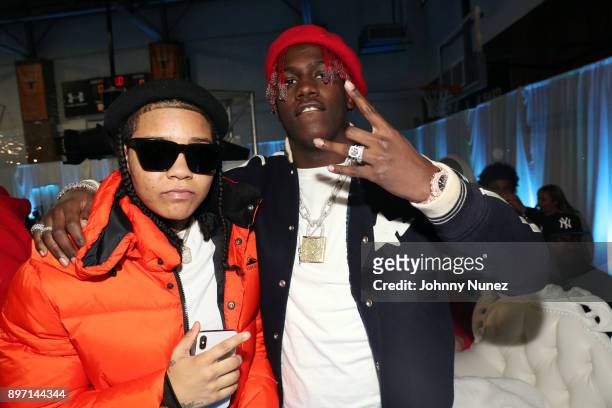 Young M.A and Lil Yachty attend The 2017 "Winter Wonderland" Holiday Charity Event hosted by La La Anthony at Gauchos Gym on December 21, 2017 in New...