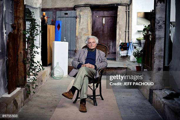 Art collector and art critic Franck Popper poses on August 6, 2009 in the Franck Popper contemporary art center in Marcigny, eastern France where...