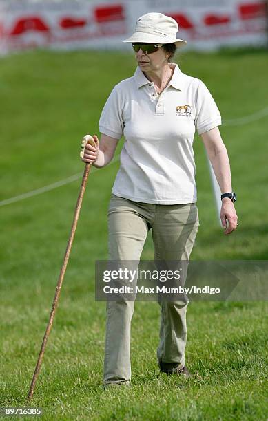 Princess Anne, The Princess Royal uses a walking stick as she strolls around The Festival of British Eventing held on her country estate at Gatcombe...