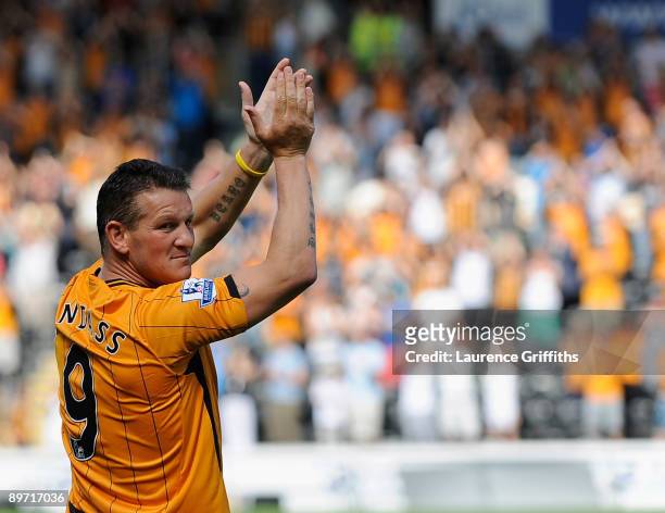 Dean Windass of Hull City applauds the fans during the Pre Season Friendly between Hull City and Aberdeen at the KC Stadium on August 9, 2009 in...