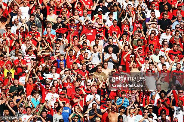 Manchester United fans look on during the FA Community Shield match between Manchester United and Chelsea at Wembley Stadium on August 9, 2009 in...