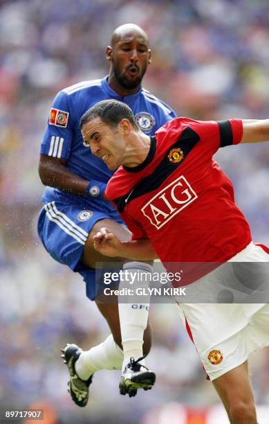 Chelsea's French striker Nicolas Anelka vies with Manchester United's Irish defender John O'Shea during the FA Community Shield at Wembley Stadium,...