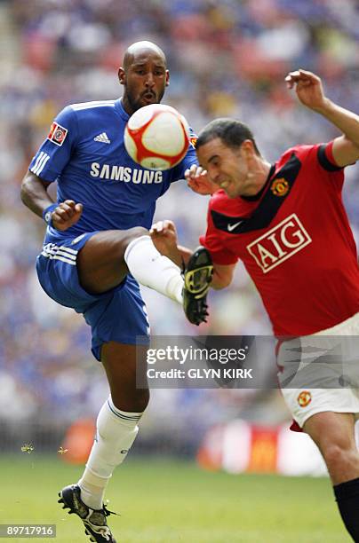 Chelsea's French striker Nicolas Anelka vies with Manchester United's Irish defender John O'Shea during the FA Community Shield at Wembley Stadium,...