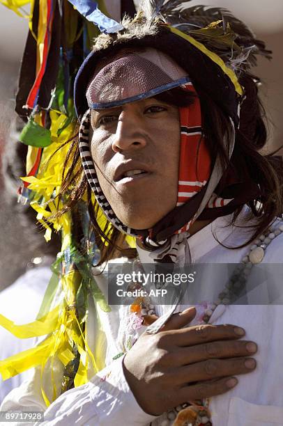 An Ecuadorean shaman carries out the "spiritual cleasing" of Ecuadorean and Bolivian Presidents Rafael Correa and Evo Morales respectively, during a...