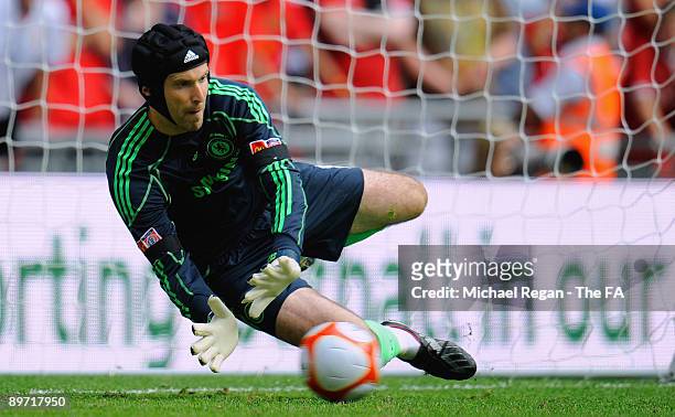 Petr Cech saves a penalty from Patrice Evra during the FA Community Shield match between Manchester United and Chelsea at Wembley Stadium on August...
