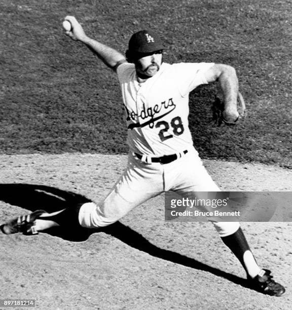 Pitcher Mike Marshall of the Los Angeles Dodgers throws the pitch during Game 1 of the 1974 World Series against the Oakland Athletics on October 12,...
