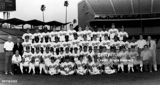 The 1985 Los Angeles Dodgers pose for the team photo Batting practice catcher Todd Maulding, batboys Mark Bossert, Dan Edwards, Jon Scott and Ben...