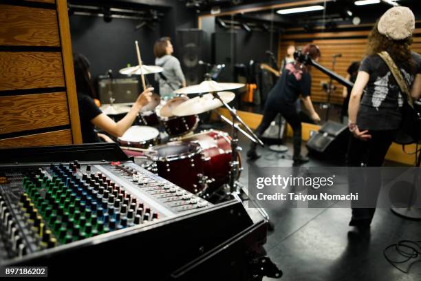 practice scene of female rock band - the sounds band stock pictures, royalty-free photos & images