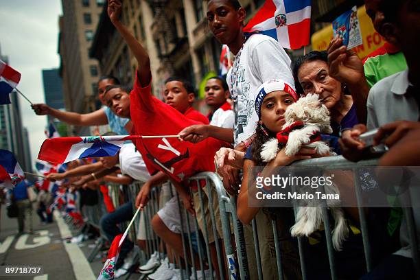 Supporters look on at the start of the annual Dominican Day parade August 9, 2009 in New York City. The annual parade draws hundreds of thousands of...