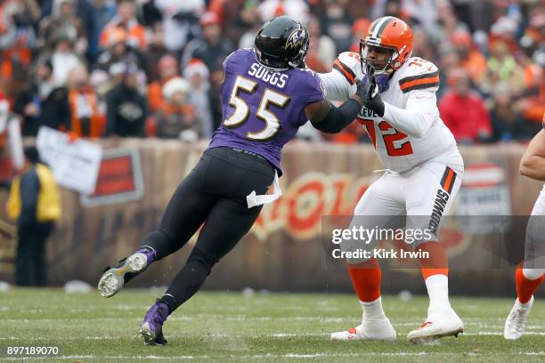 Shon Coleman of the Cleveland Browns defends against Terrell Suggs of the Baltimore Ravens during the game at FirstEnergy Stadium on December 17,...