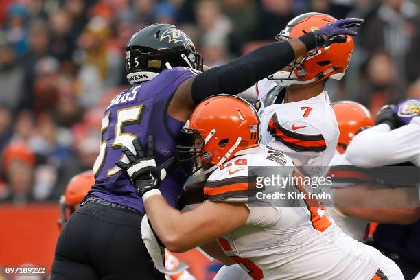 Terrell Suggs of the Baltimore Ravens is blocked by Spencer Drango of the Cleveland Browns during the game at FirstEnergy Stadium on December 17,...