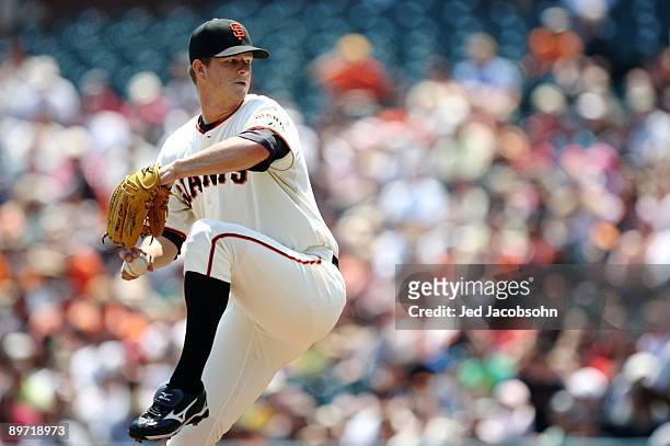 Starting pitcher Matt Cain of the San Francisco Giants throws a pitch against the Cincinnati Reds at AT&T Park on August 9, 2009 in San Francisco,...