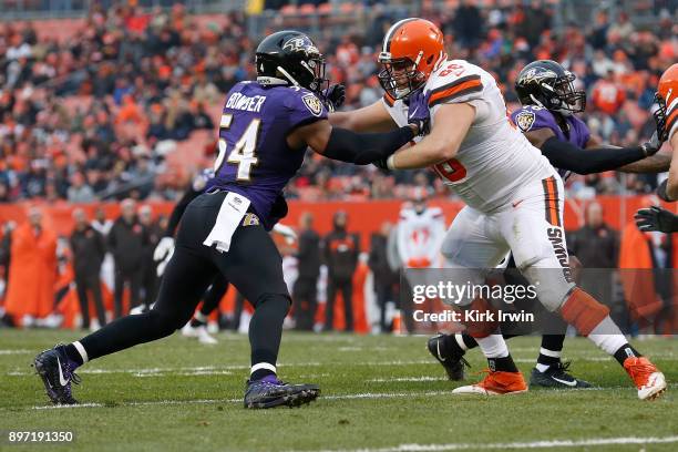 Tyus Bowser of the Baltimore Ravens attempts to rush past Spencer Drango of the Cleveland Browns during the game at FirstEnergy Stadium on December...