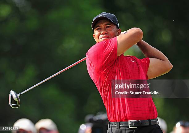 Tiger Woods of USA plays his tee shot on the 14th hole during the final round of the World Golf Championship Bridgestone Invitational on August 9,...