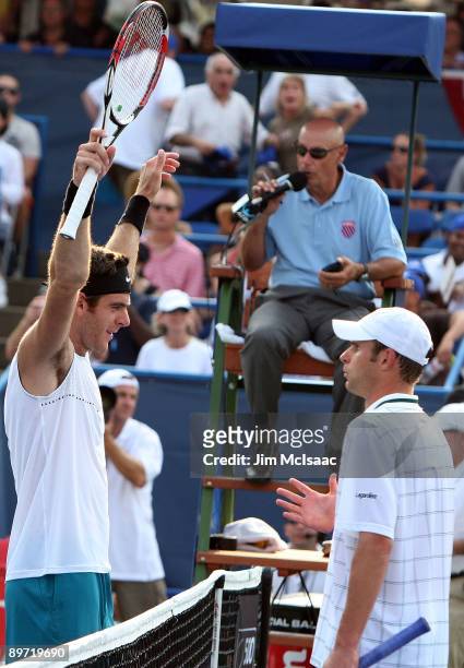 Juan Martin Del Potro of Argentina celebrates at the net after match point was awarded on a challenge against Andy Roddick during Day 7 of the Legg...